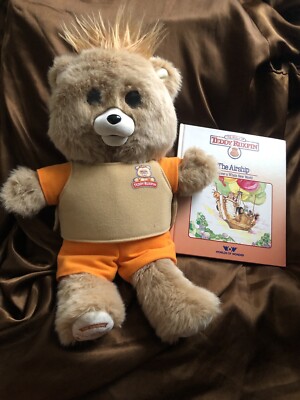 Teddy Ruxpin talking bear with one