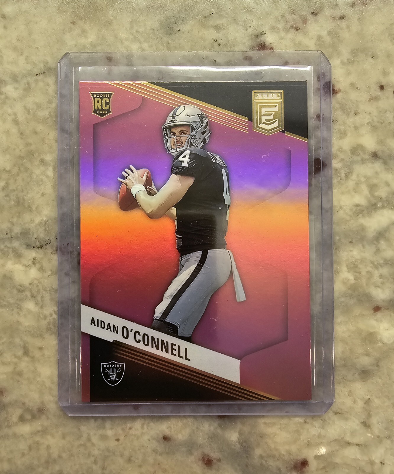 2023 Panini Elite Football Aidan O’Connell Pink Parallel RC #101