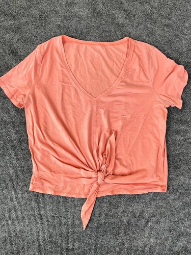 Lululemon Short Sleeve Top Light Coral  Knot  Gonna Fly No Size Tag M/L?