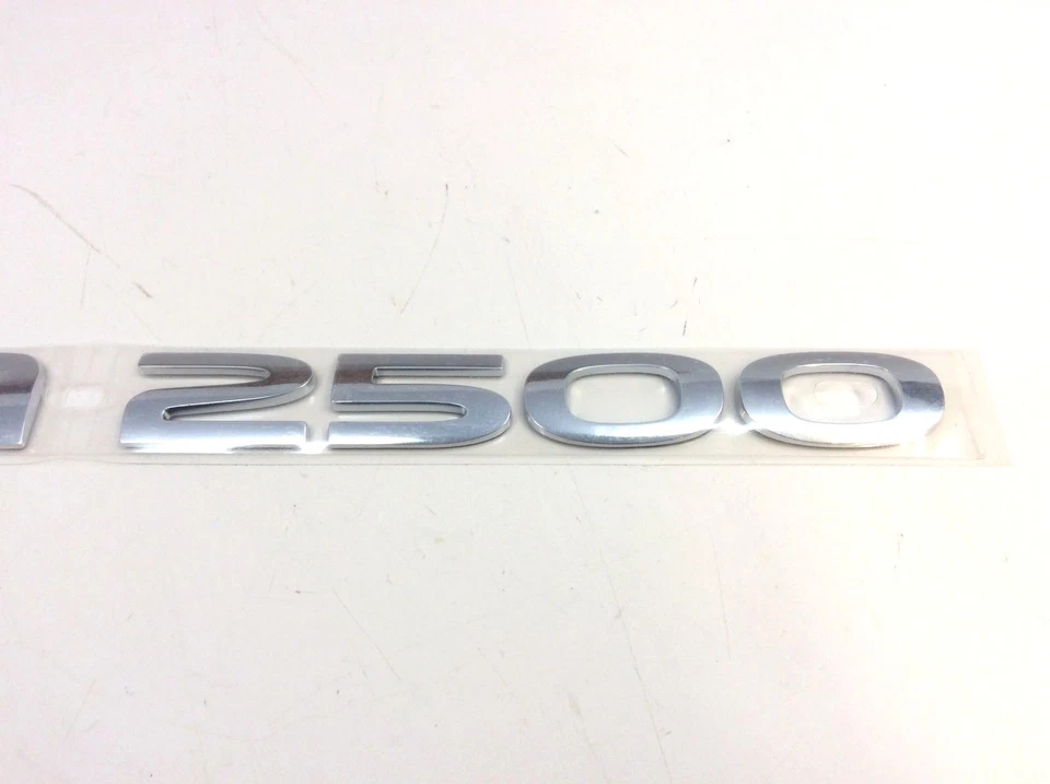 Dodge RAM 2500 2003-2007 placa de identificación cromada puerta delantera emblema nuevo OEM 55077331AB Foto 4 de 4