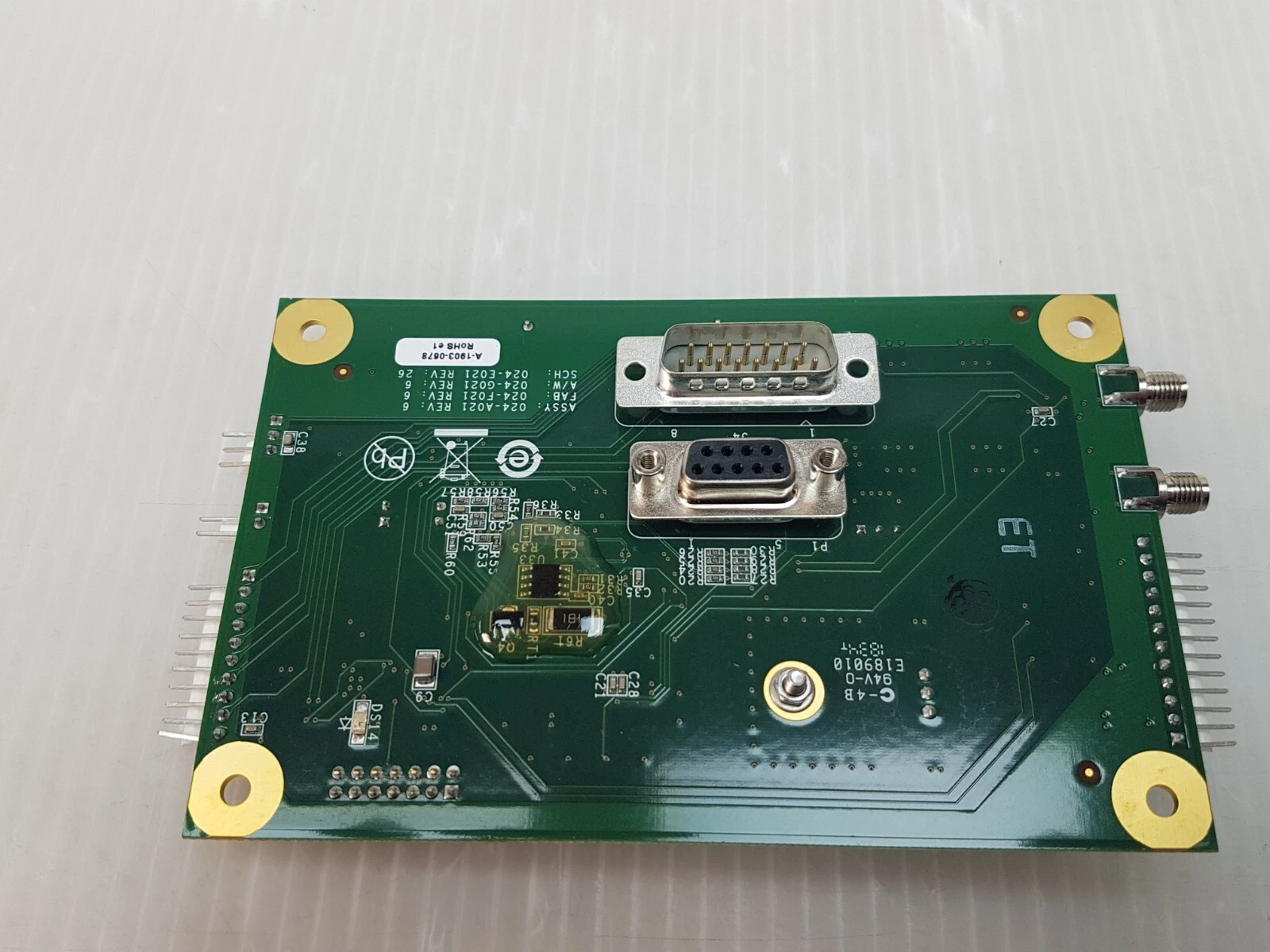 Underside of 024-A021 board with 15-pin and 9-pin D-sub connectors