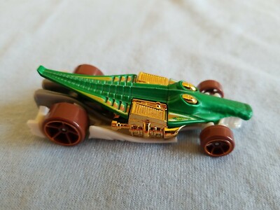 Hot Wheels Thrill Racers Jungle - Macchinina Coccodrillo Scala 1:64, Verde (Modello 3/6 Croc 213/244)