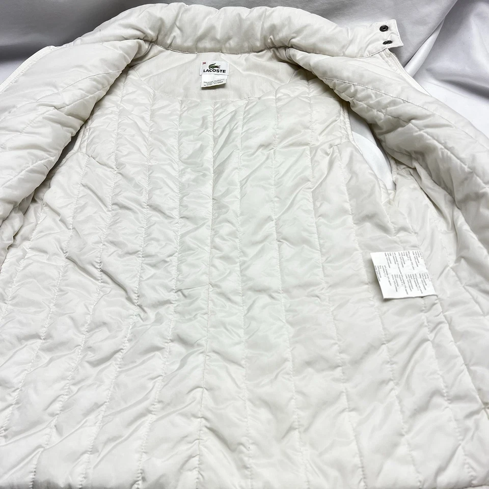 Chaleco deportivo Lacoste para mujer 36 pequeño marfil cremallera completa chaqueta bolsillos acolchados golf Foto 4 de 4