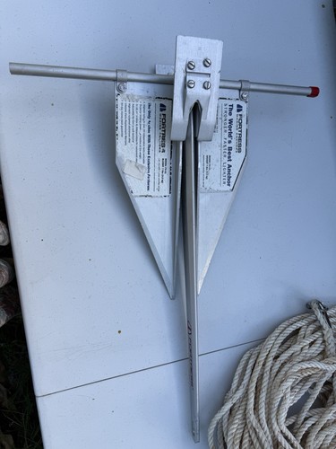 Fortress FX-11 aluminum boat anchor with rope included. Good condition.