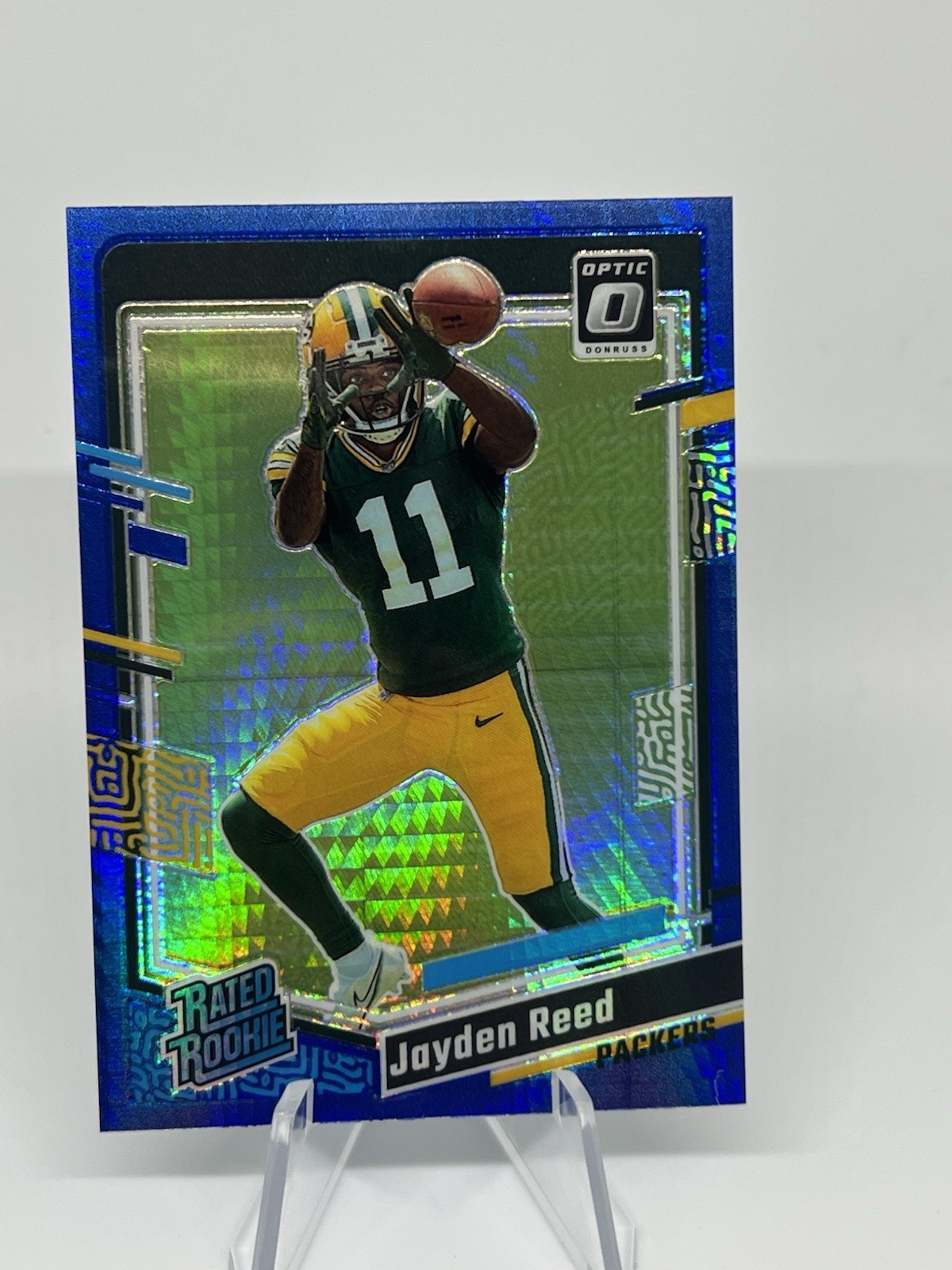 2023 Panini Donruss Optic - Rated Rookie Jayden Reed #239 Blue Hyper Prizm (RC)