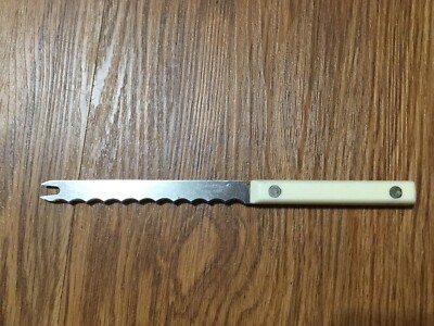 Vintage  HOLLOW GROUND KITCHEN BUTCHER KNIFE SERRATED White  Handle