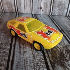 Vintage Porsche 928 Non-Working Friction Powered Yellow Plastic Toy Car