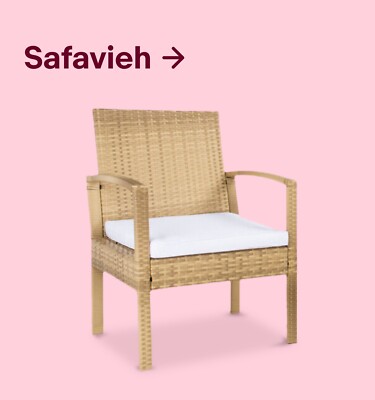 A rattan Safavieh Bassey outdoor chair with a white square cushion.