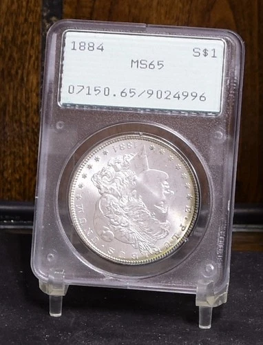 1884 Morgan Dollar - OGH PCGS MS65 (#60791-L)