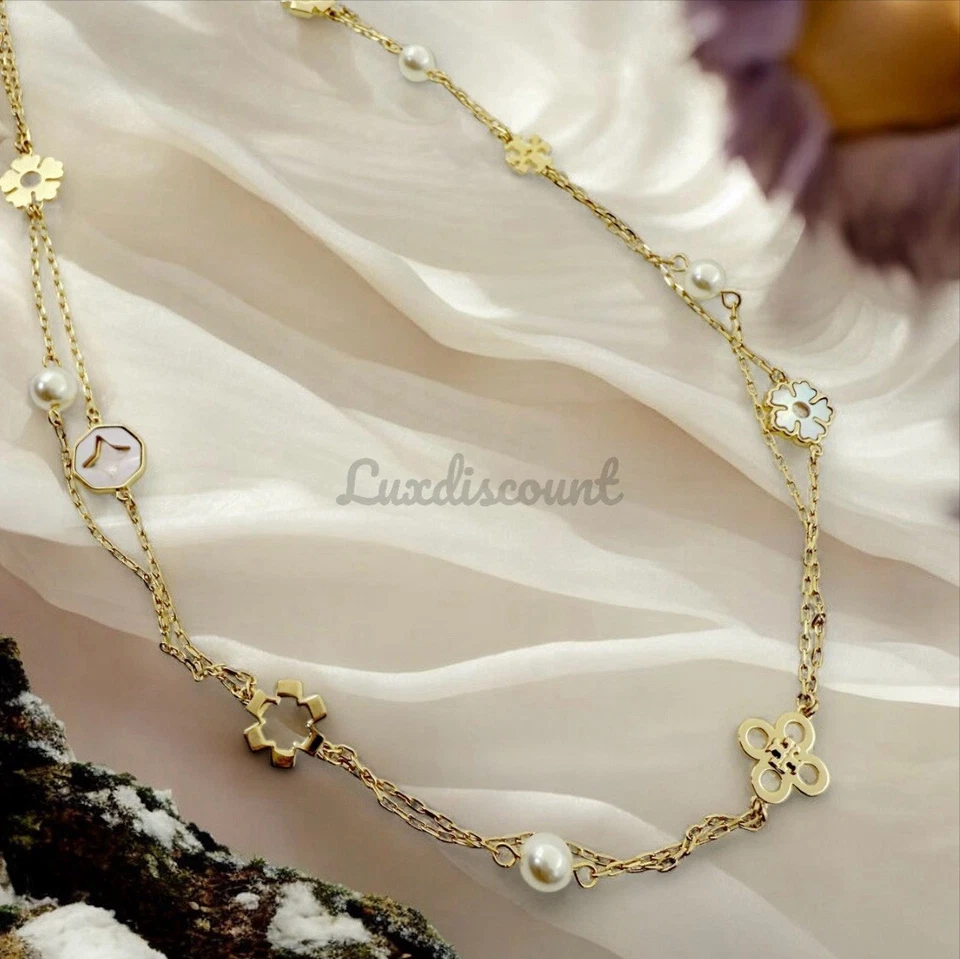 Collar de cadena Tory Burch Kira chapado en oro de 18 quilates y perlas de imitación en capas Foto 3 de 4