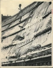 1952 Press Photo Crews Repair Hungry Horse Dam Catwalks Ripped by Avalanches