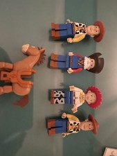 LEGO Toy Story Woody’s Roundup figures – Woody, Jessie, Stinky Pete, Bullseye”