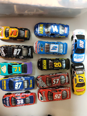 NASCAR 1/64 RANDOM SELECTION OF 12 CARS IN MINT CONDITION-NO BOX  LOT #3
