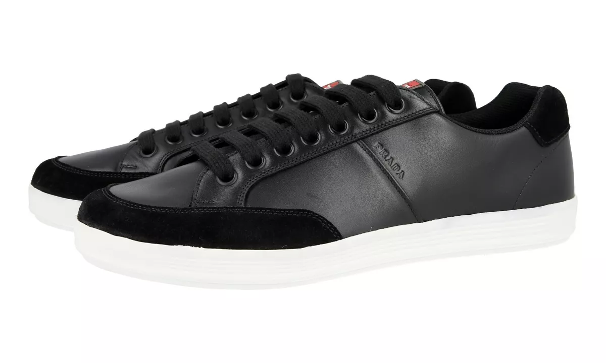 Shop PRADA Leather Logo Outlet Sneakers (2EG355) by winwinco | BUYMA