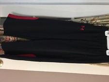 UA Youth M Black Sweatpants with red trim