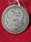 1880-O CIRCULATED MORGAN 90% SILVER DOLLAR  ME VS YOU   SCRATCH         #T3840 — photo 1