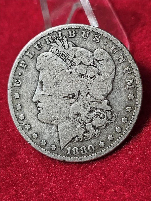 1880-O CIRCULATED MORGAN 90% SILVER DOLLAR  ME VS YOU   SCRATCH         #T3840