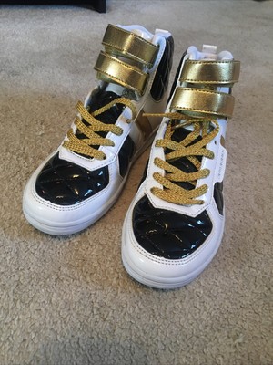 boys black and gold trainers
