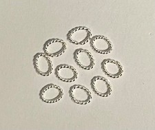 Ten oval sterling silver twisted wire open jump rings, 5x7mm