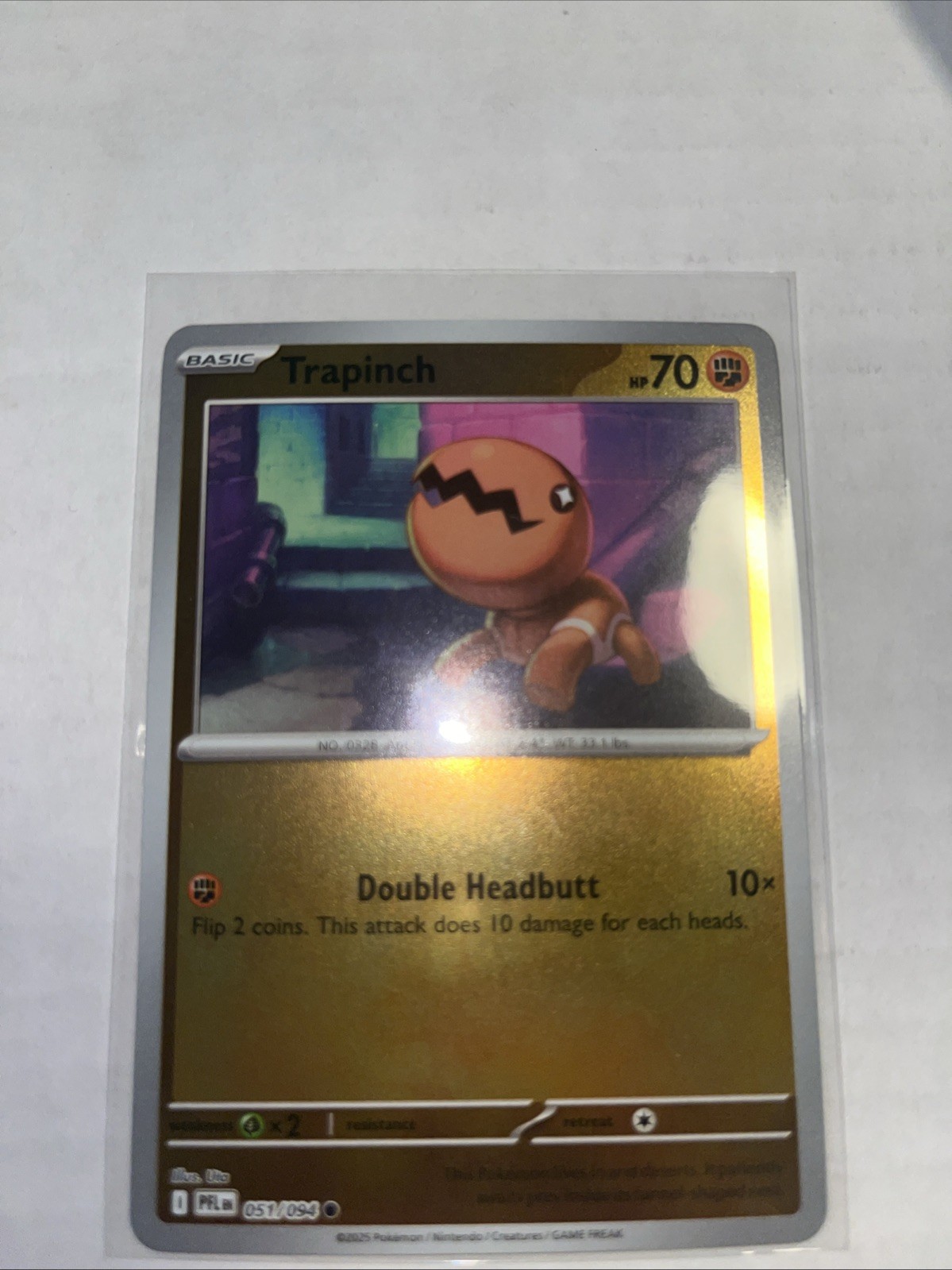 Trapinch 051/094 Me02: Phantasmal Flames Reverse Holo
