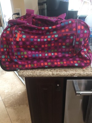 pink duffle bag with wheels