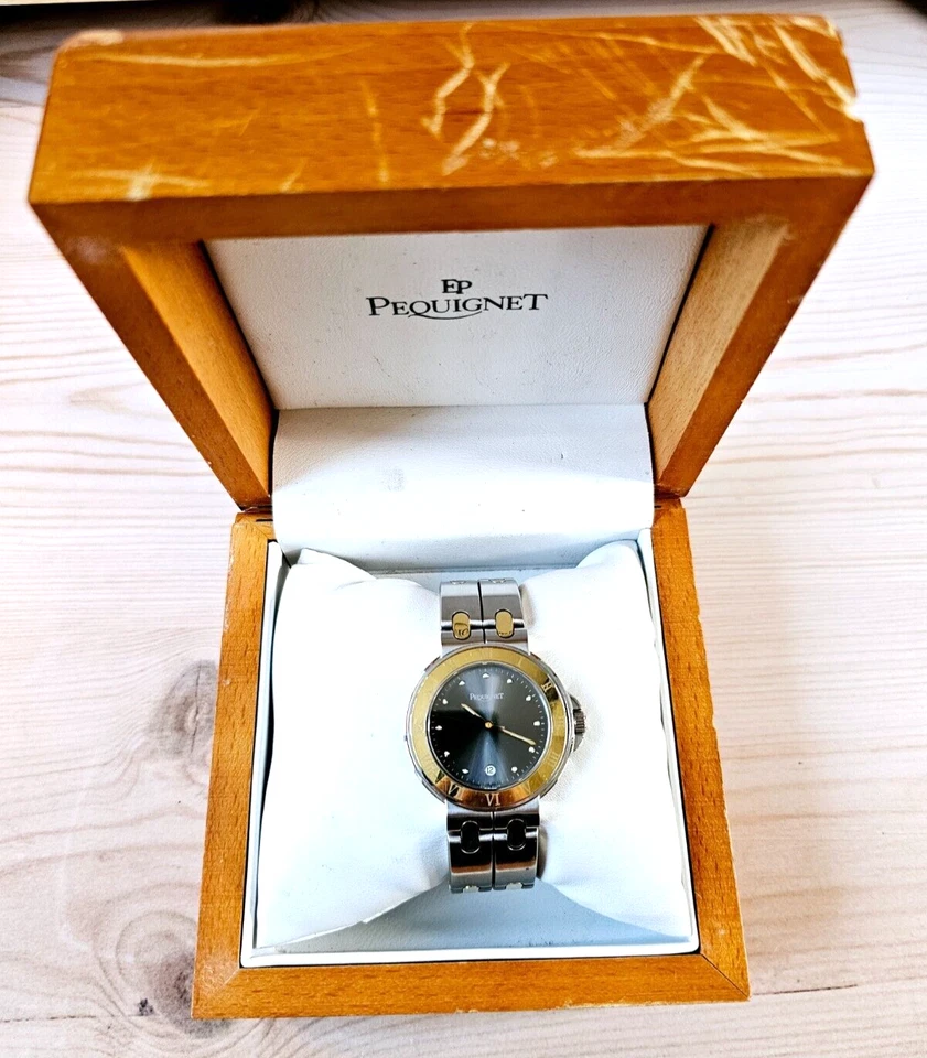 Pequignet Moorea Dos Tonos Bisel Oro 18k Acero Esfera Negra Fecha Cuarzo - 38mm Foto 2 de 4