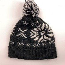 Old Navy black with bold white snowflake pattern pom-pom knit hat