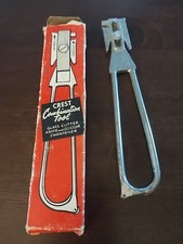The vintage Crest combination tool, likely da...
