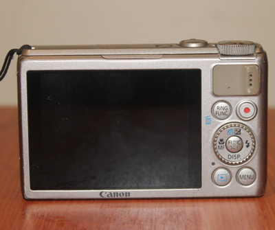 Canon PowerShot S100 12.1MP Digital Camera - Silver FOR PARTS AND