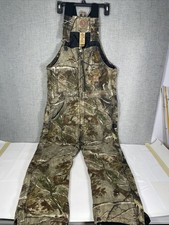 Mono con tirantes aislado camuflaje Berne Realtree para hombre mediano regular MR caza
