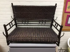 ANTIQUE VTG BROWN WICKER PORCH SWING WITH HANGING BRACKETS 38 X 27 X 19” DEEP 