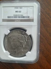 1924 $1 Peace Dollar. NGC MS-62.