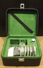 Revue Super-8 De Luxe Pusta walizka z filtrem nosorożcowym / osłonami / soczewkami i zasilaczem