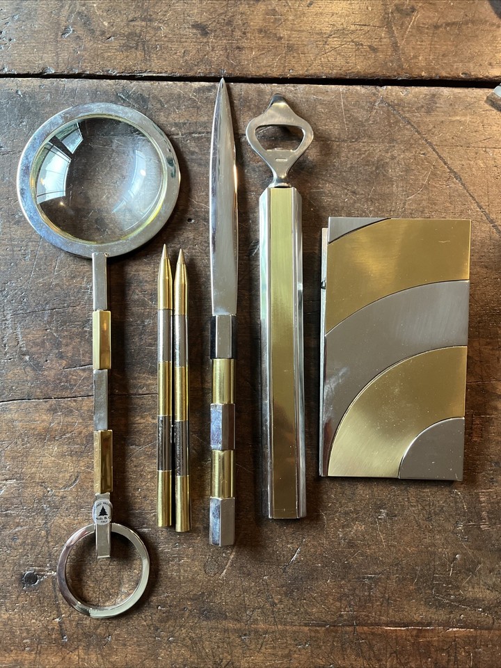 Six-piece Italian MCM chrome & brass desk set by Noel B.C. — coordinated 1970s modernist desk hardware that belongs in a design museum.