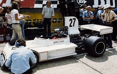 James Hunt sits his March 731 Ford the pit lane at the British GP - Old Photo