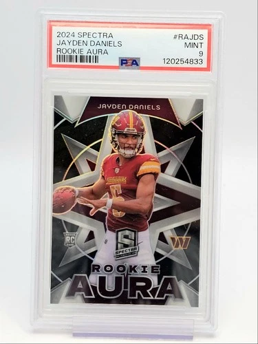 JAYDEN DANIELS 2024 SPECTRA ROOKIE AURA SILVER COMMANDERS RC /125 PSA 9 Q0004