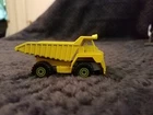 Vintage 1979 Hot Wheels yellow Caterpillar 777B Dump Truck Workhorse series