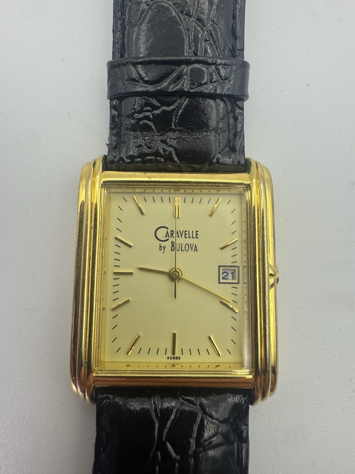 Caravelle by Bulova Quartz Gold Tone Rectangular Date Dress Watch – Running