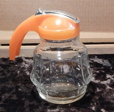 Vintage Glass Syrup server, orange top, glass, retro, great shape.