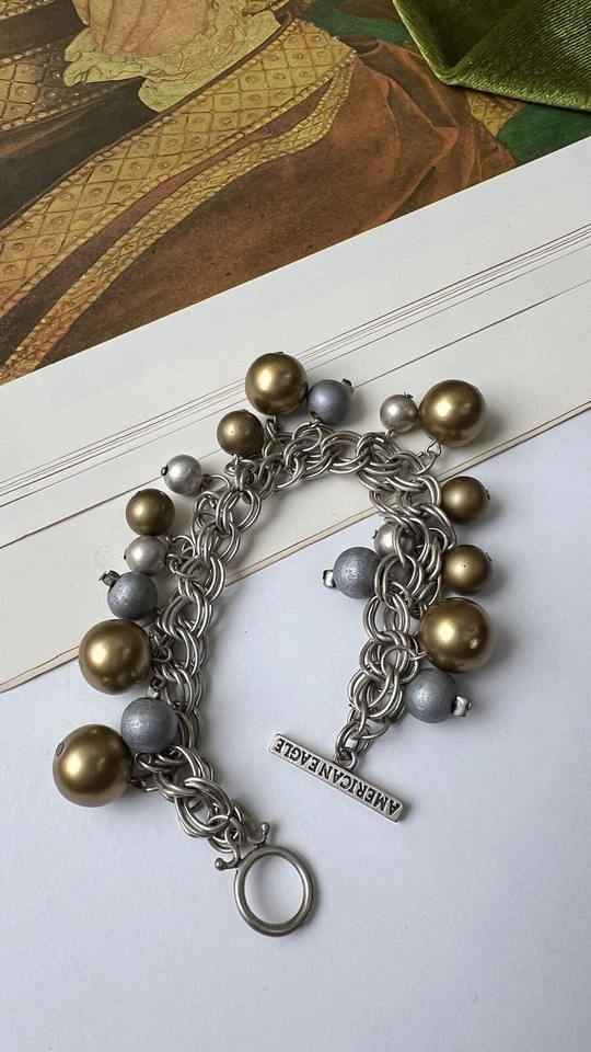 Pulsera American Eagle Vintage Tono Plata Oro y Plata Cuelga Joyería 🩶 Foto 2 de 4