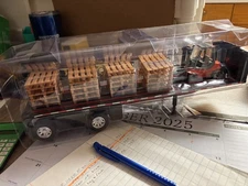 1/32 NEW RAY  NEW BLACK FLATBED W/  PALLETS & FORK LIFT, NO PACKAGING #B 752