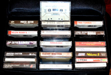 19 music cassettes tapes with black zipper carry case