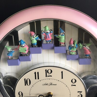 Seth Thomas Melody & Motion Piano Keys Orchestra Pink Frame Clock