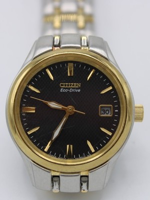 Citizen Eco-Drive Watch E011-S049571 Round Face Two Tone Silver Gold Woman clean