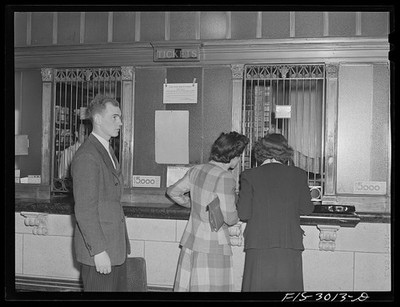 Photo:Lincoln Nebraska 1942 John Cockle buying railroad ticket to Omaha