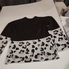 Handmade womens sweater. Solid With Animal Print. Brown And White.