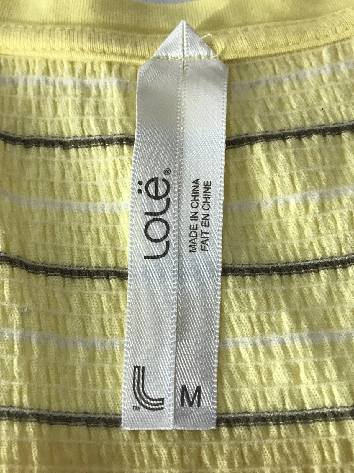 lole medium sleeveless black striped v neck shirt