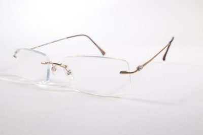 Stepper Brille F012 Unisex Gold Randlos Titan Eyewear Brille Brillengestell