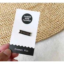 Introvert Enamel Pin Black Gold