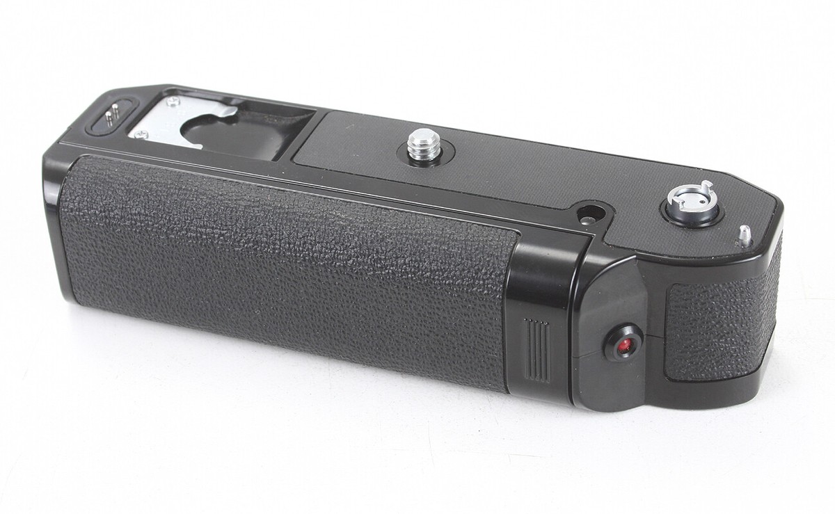 にー CANON POWER WINDER A, SOME CORROSION IN BATTERY COMPARTMENT